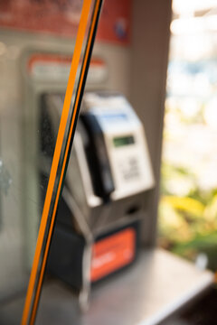 blurry shot of a pay phone set up for free calls