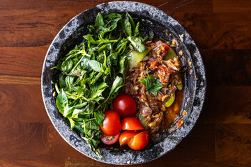 chili dip with fresh lemon basil, tomato and shallot, sambal pecak indonesian dish