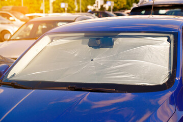 Car windshield sunshade providing protection from intense sunlight and UV rays in heat season,  keep the vehicle's interior cool and shield the dashboard from heat damage