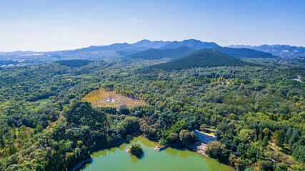 Fototapeta premium Aerial photos of the green mountains in the distance