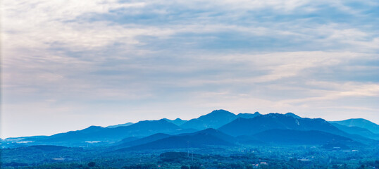 Aerial photos of the green mountains in the distance