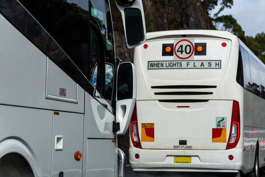 40 when lights flash sign on back of busses traveling in heavy traffic on highway