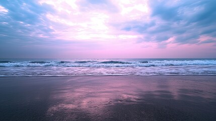 A serene ocean view at dusk, featuring gentle waves and a colorful sky, creating a tranquil atmosphere.