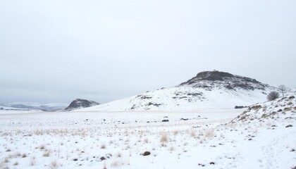  Snowcovered mountain under a cloudy sky
