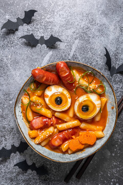 Naklejki original traditional korean food tteokbokki with red sauce for halloween