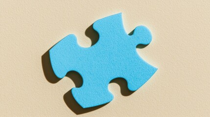 Obraz premium Solitary blue puzzle piece on a textured light background
