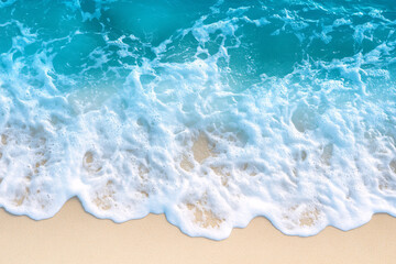 Obraz premium blue ocean waves crashing on sandy beach - summer background
