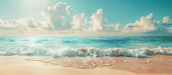 Enhance the color filters of a scenic beach setting with an expanse of sand and sea to create a vibrant image with room for text or other elements known as a copy space image