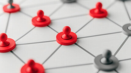 Red and gray user icons interconnected in an abstract network on a white background, symbolizing social links and the essence of a digital community.