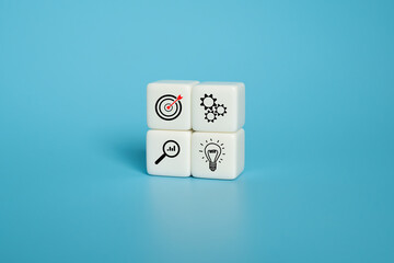 white cube with icon display for process optimization with target sign, Using idea and brainstorm knowledge to improve workflow in organization or production line in factory. Shot on blue background