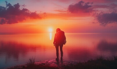 Fototapeta premium Traveler at Sunset on Lakeside Horizon
