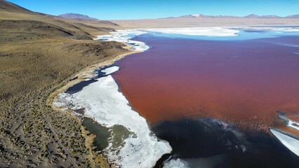 Laguna Colorada. Red salt lake in the southwest of the altiplano of Bolivia. The red color is caused by red sediments of some algae.