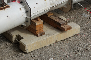 support for a large pipe on construction site