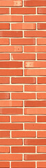 Obraz premium A brick wall texture background with red and brown tones