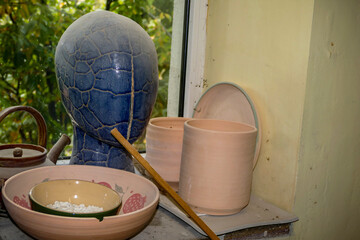 ceramic products on the windowsill, head, vases, pots, master class, workshop, potter, excursion, entertainment  