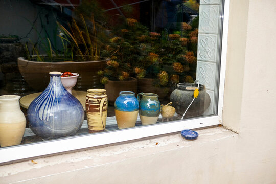 ceramic products on the windowsill, head, vases, pots, master class, workshop, potter, excursion, entertainment  
