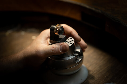 The work of jewelers. Trial jewelry of semiprecious metals. Ring. Selective focus. Macro photo.
