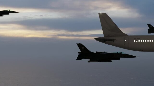 Combat aircraft escorting passenger aircraft