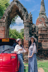 Portrait couple woman travel in Ayutthaya , Thailand. 