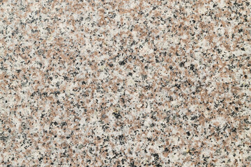 Polished granite texture in beige and grey tones with uniform natural pattern