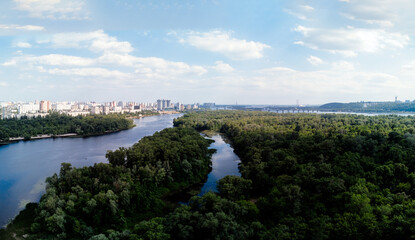 Fototapeta premium Aerial drone view of Dnipro river and Kyiv city.