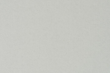 Smooth, neutral-toned surface with subtle texture