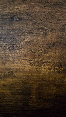 Obraz premium closeup of beautiful deep brown stained rustic wood texture background 
