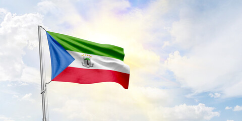 Equatorial Guinea flag waving on sky background. 3D Rendering