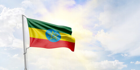 Ethiopia flag waving on sky background. 3D Rendering