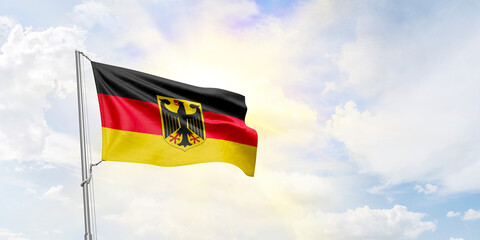 Germany flag waving on sky background. 3D Rendering