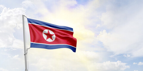 Korea North flag waving on sky background. 3D Rendering
