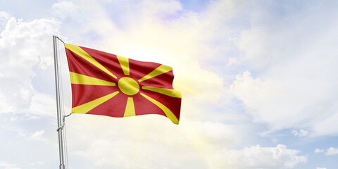 Macedonia flag waving on sky background. 3D Rendering