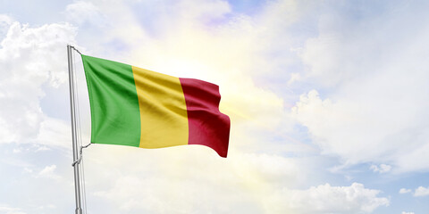 Mali flag waving on sky background. 3D Rendering
