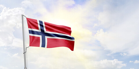 Norway flag waving on sky background. 3D Rendering