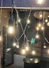 round light bulbs in the alleys of city hangouts in front of bars