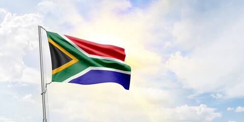 South Africa flag waving on sky background. 3D Rendering