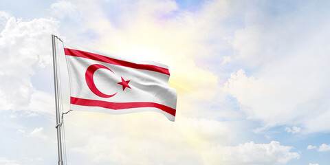 Turkish Republic of Northern Cyprus flag waving on sky background. 3D Rendering