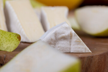 fresh cheese on a cutting board