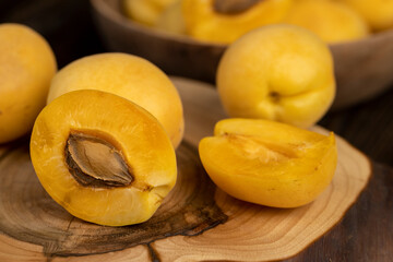 ripe soft apricot fruits on the cutting board