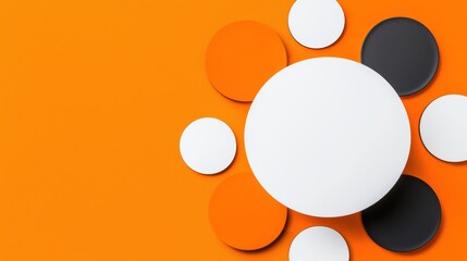 Colorful geometric shapes arranged artistically on a vibrant orange background.