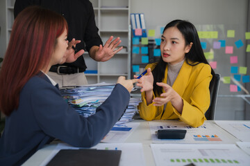 Office Collaboration:  A diverse team of professionals engaged in a dynamic and engaging...