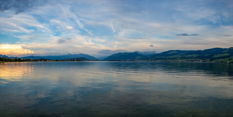 Scenic sunset view of the Upper Zurich Lake (Untersee) seen from the Holzbrücke (wooden bridge), Rapperwil, Switzerland