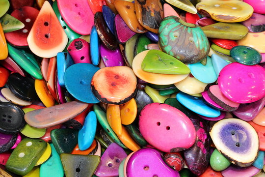 colorful buttons for clothes made of vegetable ivory also called tagua nut created by the artisan