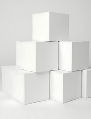 Stacked white boxes pile up in a towering high heap of identical cardboard containers.