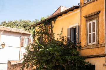 Architecture of Rome, Italy. Old buildings and streets on sunny summer day