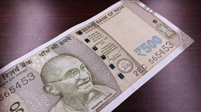Close up view of brand new indian rupees banknotes. Money background.