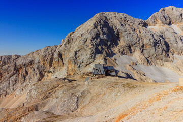 Slovenian military helicopter flying in the slovenian alps julian alps