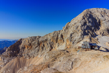 Slovenian military helicopter landing in the slovenian alps julian alps near triglav mountain hut and triglav mountain