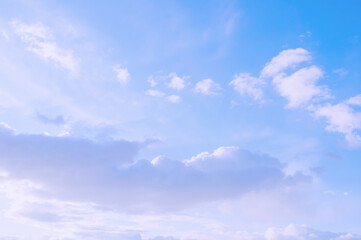 Sky background in soft pastel tones, dramatic sky in pastel tones, vast panoramic sunset sky with soft clouds