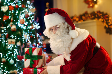 Santa Claus on Christmas eve. Presents under tree.